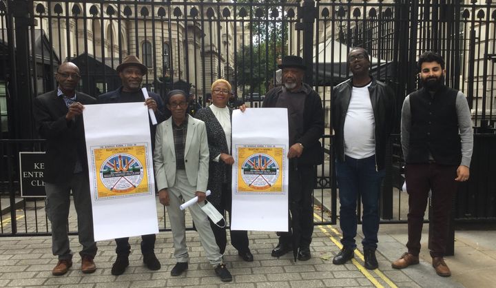 Michael Braithwaite, Anthony Bryan, Paulette Wilson, Glenda Caesar, Elwaldo Romeo, Patrick Vernon and Satbir Singh director of the Joint Council for the Welfare of Immigrants (JCWI), delivering Downing Street petition.