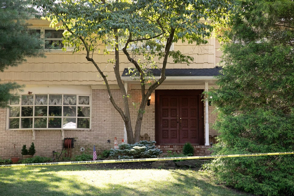 Crime scene tape surrounds the home of U.S. District Judge Esther Salas, Monday, July 20, in North Brunswick, New Jersey. A g