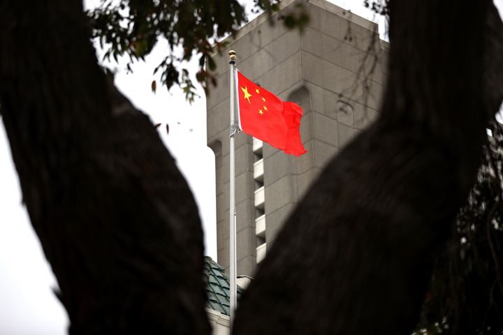 The Chinese flag flies over the Consulate General of China on July 24, 2020 in San Francisco, California. Juan Tang, a researcher at the University of California, Davis who took refuge in the Chinese consulate in San Francisco, was arrested for allegedly lying to investigators about her Chinese military service. (Photo by Justin Sullivan/Getty Images)