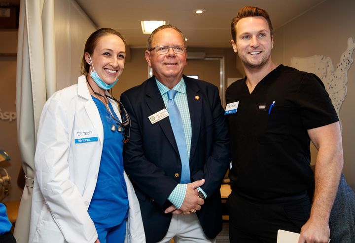 Congressional aide Gary Tibbetts, pictured center in 2019, died from COVID-19 at the Manatee Memorial Hospital in Bradenton, Florida.