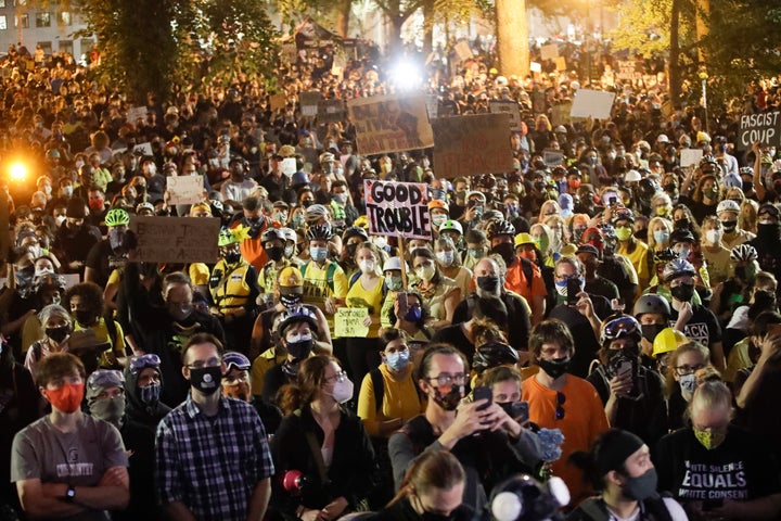 Demonstrators gather during a Black Lives Matter protest at the Mark O. Hatfield United States Courthouse Saturday, July 25,