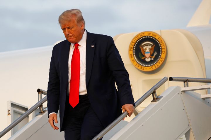 In this July 24, 2020, file photo, President Donald Trump steps off Air Force One at Morristown Municipal Airport in Morristown, N.J. (AP Photo/Patrick Semansky, File)