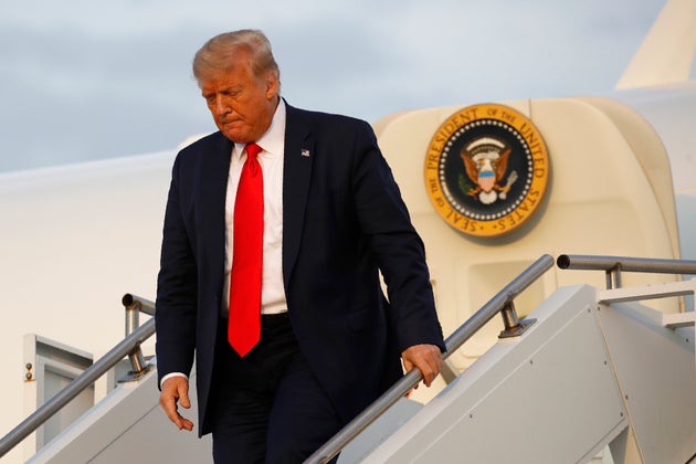 In this July 24, 2020, file photo, President Donald Trump steps off Air Force One at Morristown Municipal...