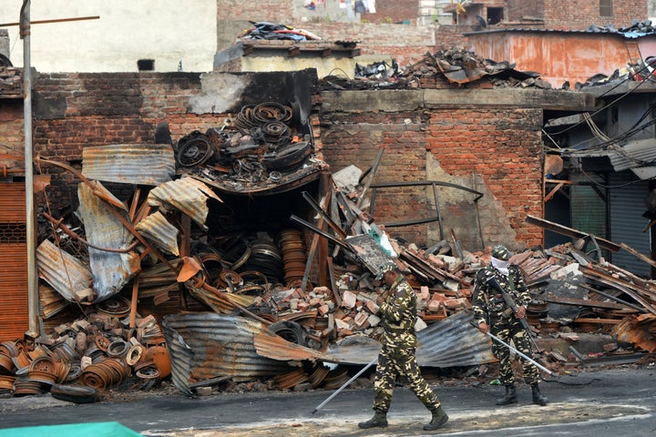 SSB personnel walks in riot affected area of Gokalpuri, New Delhi.