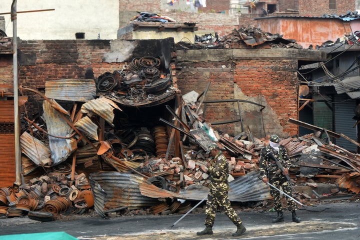 SSB personnel walks in riot affected area of Gokalpuri, New Delhi. 