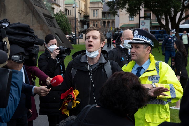 Black Lives Matter protest organiser Paddy Gibson is detained by Police in the Domain on July 28, 2020 in Sydney, Australia. 