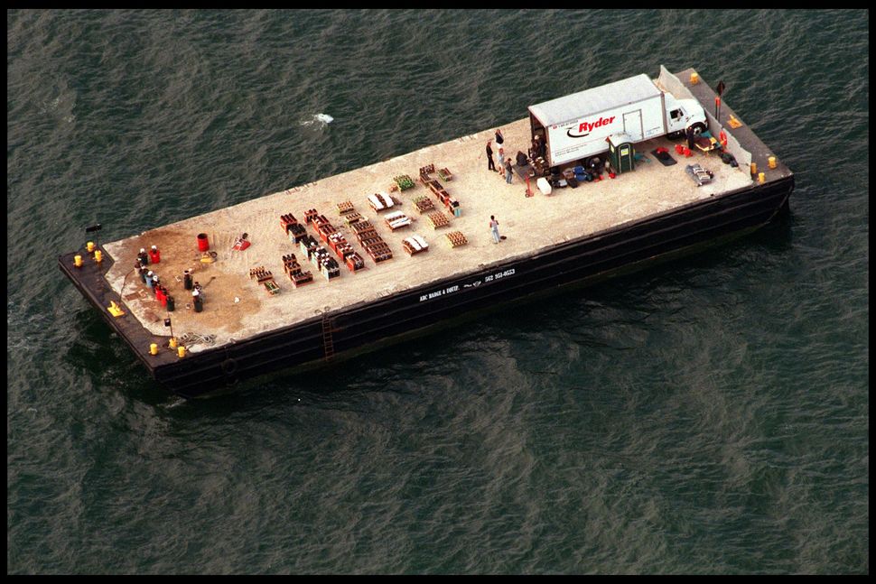 An aerial view of Brad Pitt and Jennifer Aniston's firework barge anchored off their wedding venue