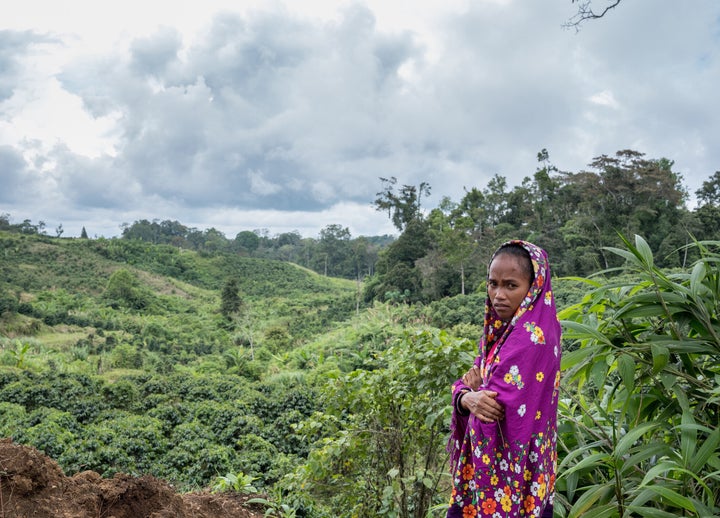 Marivic "Tarsila" Danyan overlooks coffee plantations near her village of Tabasco in the Philippines. Her father protested a coffee plantation linked to one of the country's most powerful families. In 2017, he was killed, along with Danyan's husband and two brothers.