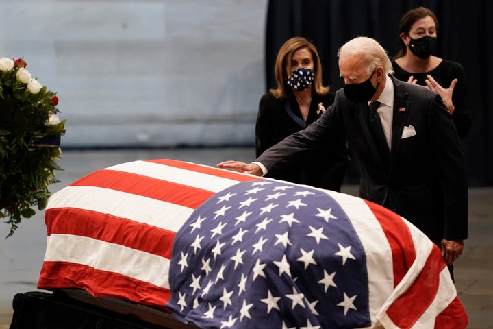 Presumptive Democratic presidential candidate Joe Biden was among the dignitaries paying respects on Monday to Rep. John Lewis of Georgia, the longtime civil rights crusader whose body lay in state at the U.S. Capitol. President Donald Trump decided not to make a similar visit. 