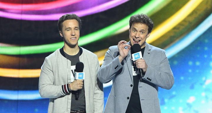 WE Craig Kielburger and Mark Kielburger speak on stage during WE Day California on April 25, 2019. 