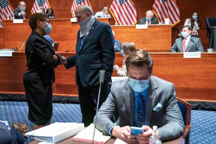 Rep. Karen Bass (D-Calif.), left, speaks with Gohmert on Capitol Hill in June. 