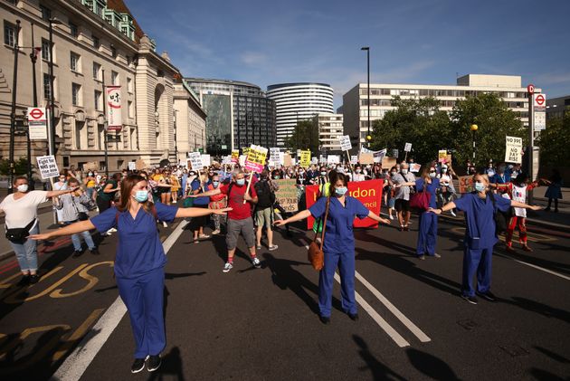 NHS workers march from St Thomas' Hospital to Downing Street, London, to demand a pay rise. Participants include the members of Unite, Keep Our NHS Public and Nurses United.