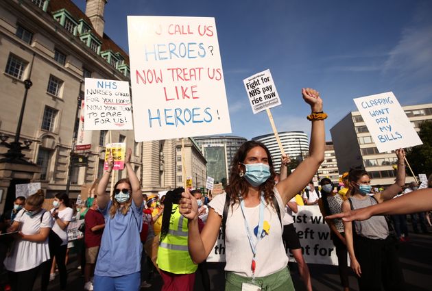 NHS workers march from St Thomas' Hospital to Downing Street, London, to demand a pay rise. Participants include the members of Unite, Keep Our NHS Public and Nurses United.