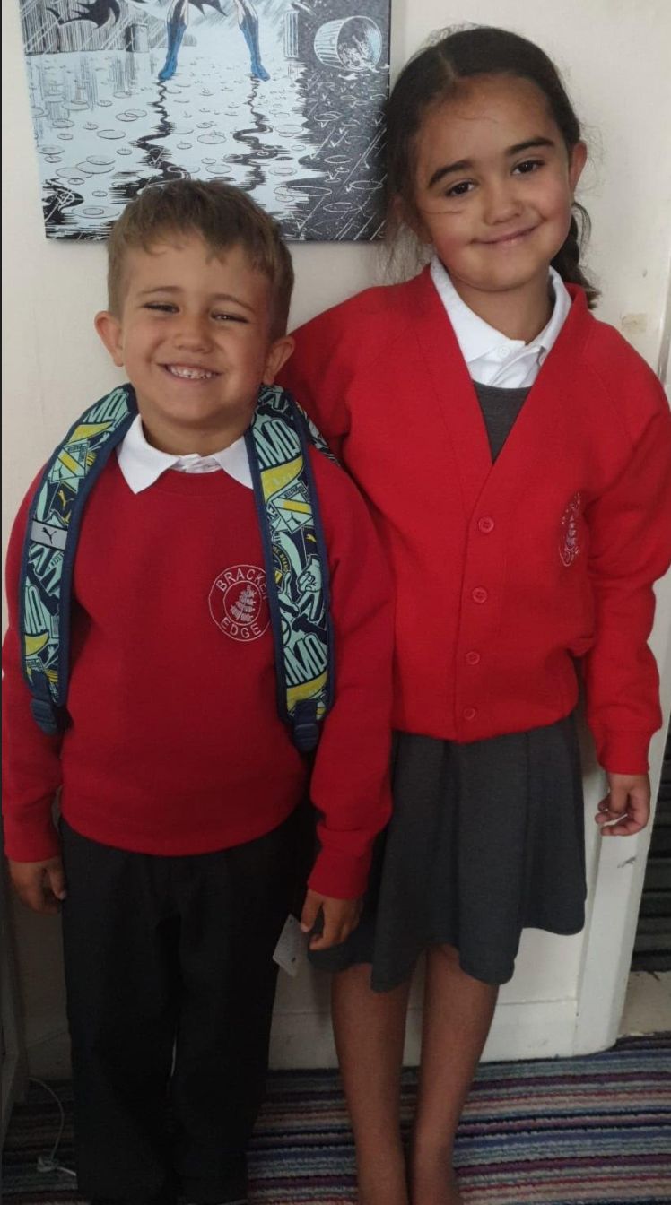 Terri-Anne's daughter Amayah, six and son AJ, four, in their new school uniforms made possible by a kindhearted HuffPost UK reader
