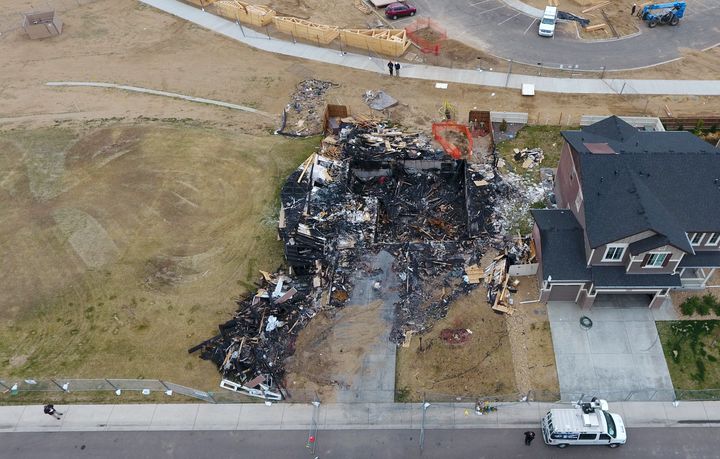 An Anadarko Petroleum gas well, in the upper left and covered by tan fencing, was located less than 200 feet from a home that exploded on April 27, 2017, in Firestone, Colorado, killing two people.