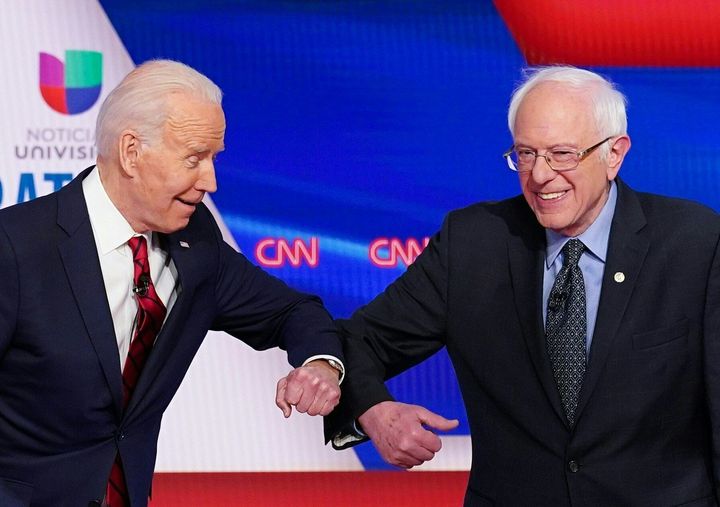 Allies of former Vice President Joe Biden (left) and Sen. Bernie Sanders (I-Vt.) both voted to extend presidential primary reforms, including the disempowerment of superdelegates.