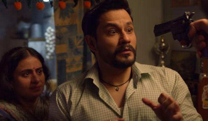 Rasika Dugal and Kunal Kemmu in a still from 'Lootcase', streaming on Hotstar.