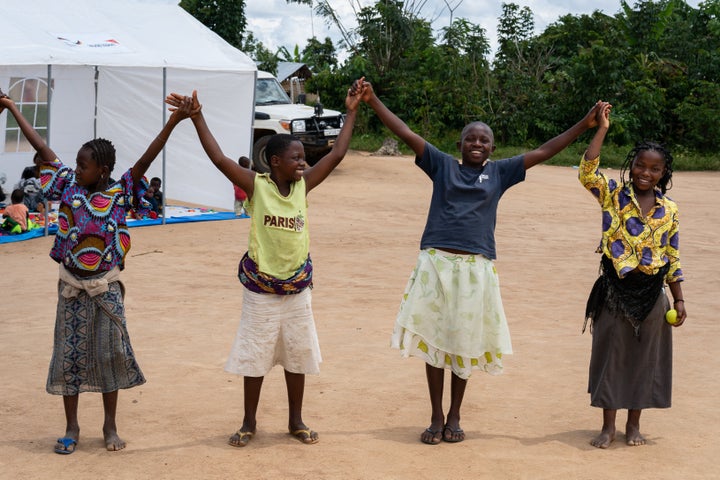Masika plays outside a World Vision CFS in eastern DRC.