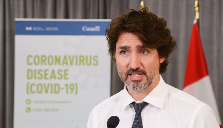 Prime Minister Justin Trudeau holds a press conference as he visits the Public Health Agency of Canada during the COVID-19 pandemic in Ottawa on July 31, 2020.