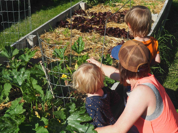 The author and her two children in their garden.