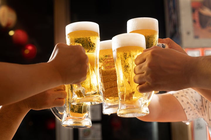 Image of toasting with beer at a tavern