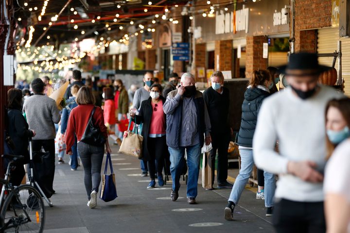 Large crowds of people are seen shopping at South Melbourne Market on August 02, 2020 in Melbourne, Australia. 