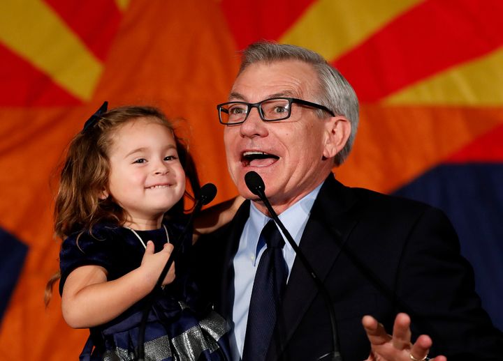 Rep. David Schweikert (R-Ariz.), with his daughter Olivia, speaking to supporters on election night in 2018. Democrats, who have a primary on Tuesday, hope to unseat him in November.