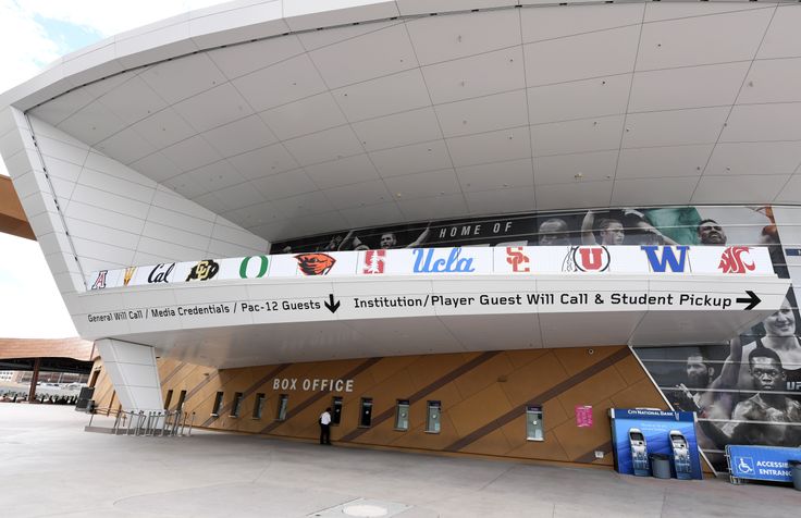 Logos of schools that were scheduled to participate in the canceled PAC-12 men's basketball tournament adorn the T-Mobile Arena in Las Vegas, Nevada, on March 2.