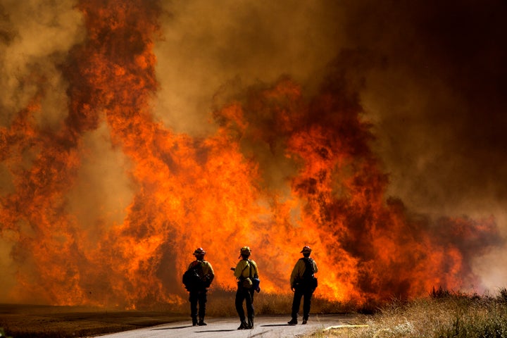 The Apple Fire in Cherry Valley, California, is estimated to have burned through roughly 20,000 acres by Sunday. It prompted thousands of people to evacuate in the state already hard-hit by the coronavirus pandemic.