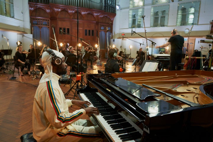 Dave plays the grand piano with the BBC Concert Orchestra on the Planet Earth special