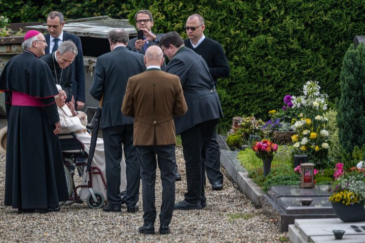 Benedict visits the grave of his parents and sister at the Ziegetsdorf cemetery near Regensburg, in June 2020. 
