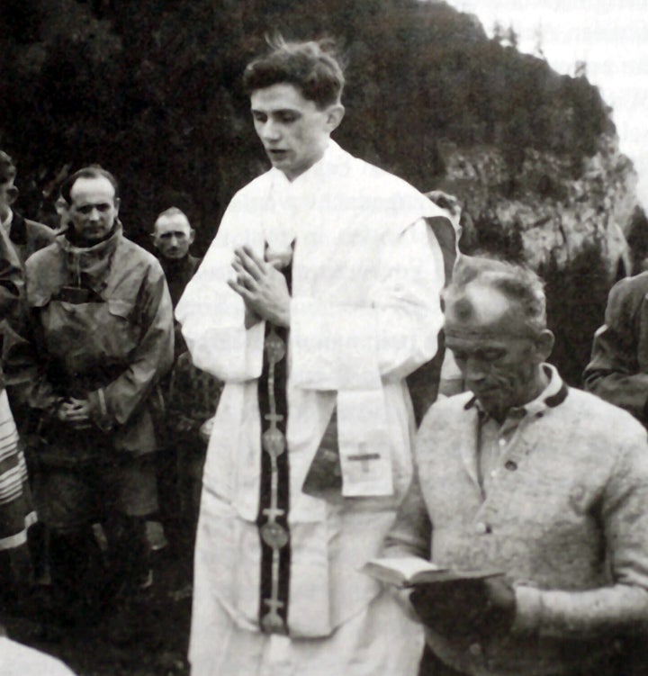 Pope Benedict XVI, Stern Defender Of Conservative Catholic Identification, Useless At 95 1 A photo taken during the summer of 1952 near Ruhpolding shows Joseph Ratzinger (center) praying during an open-air mass.