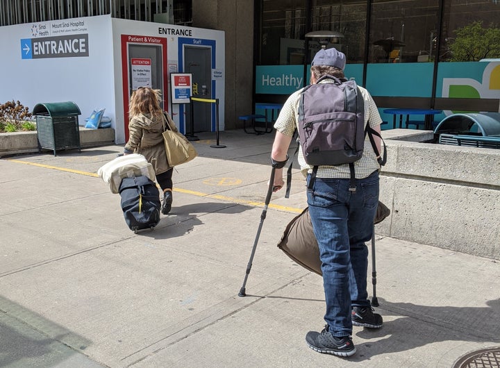 The writer and his wife enter Toronto's Mount Sinai Hospital ahead of a planned C-section.