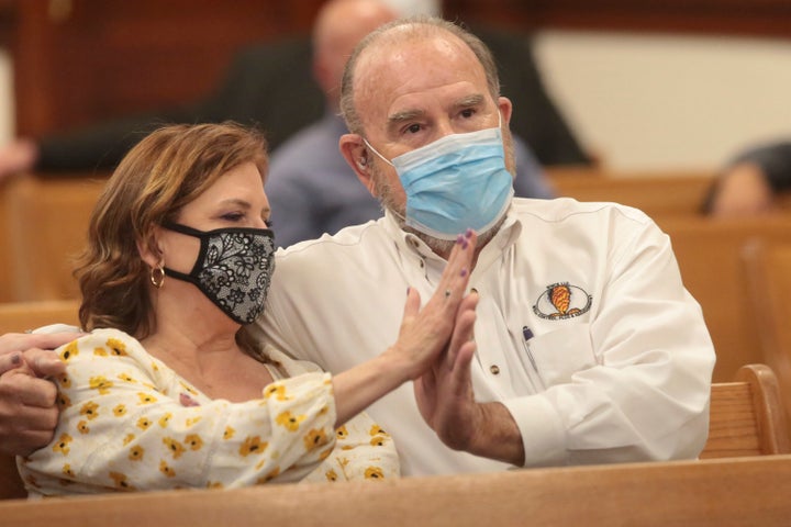 Kay and Larry Woodcock, the grandparents of 7-year-old Joshua "JJ" Vallow, react after a judge ruled there was enough evidence for Chad Daybell to go to trial.