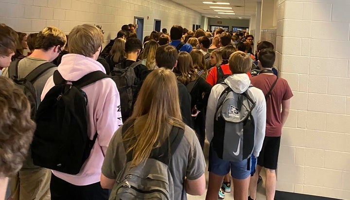 A photo taken Aug. 4, 2020, by a student at North Paulding High School in Dallas, Georgia, shows students crowding hallways w