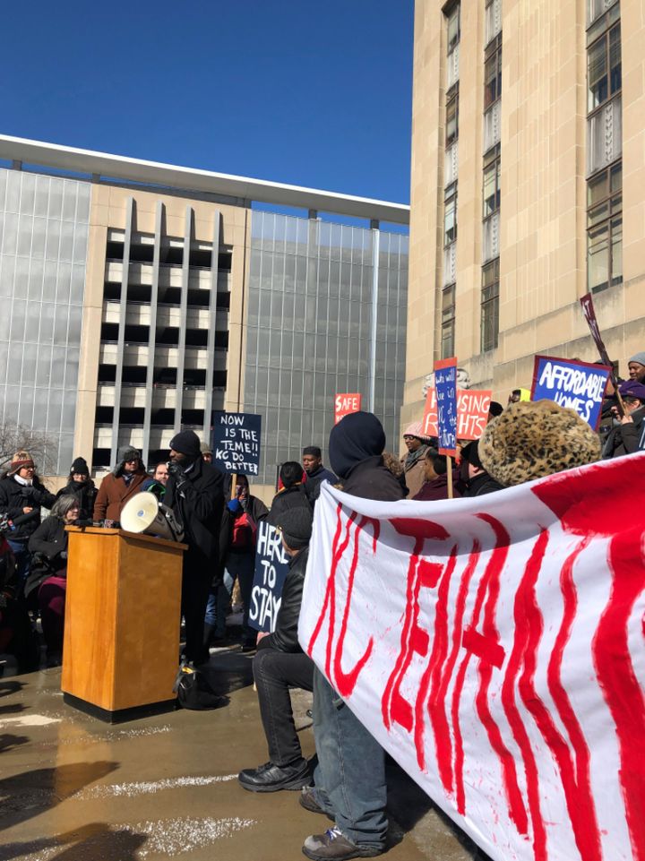 Kansas City Public Schools Superintendent Mark Bedell, at podium, supports KC Tenants' call for housing protections in March 2019. 