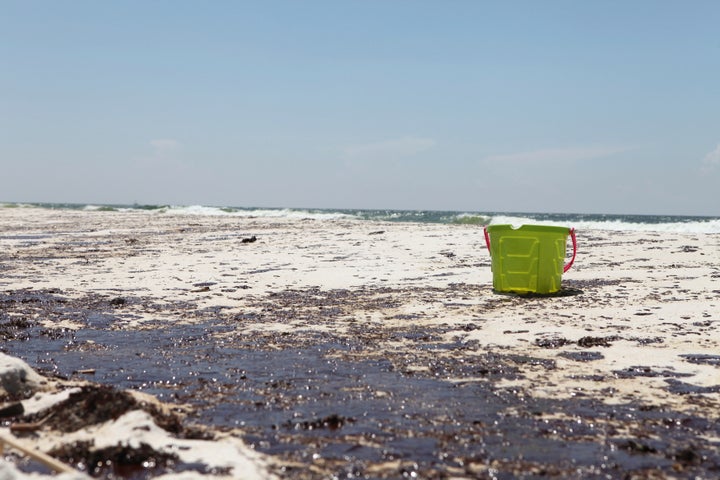 An oil-stained beach in Pensacola, Florida, in the wake of the Deepwater Horizon oil spill in 2010.