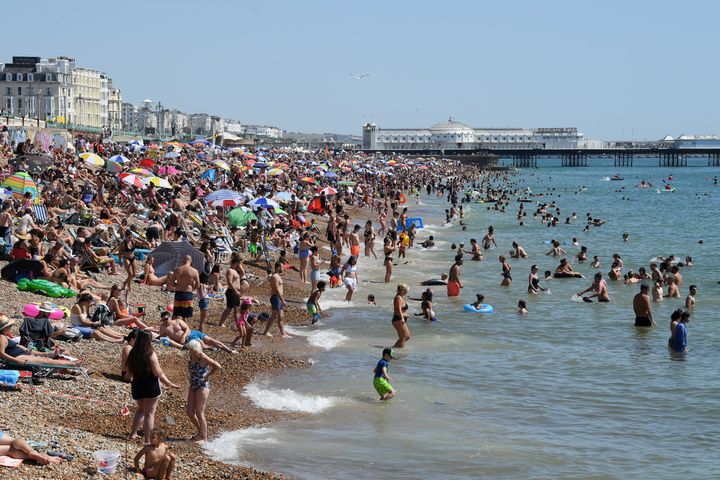 Brighton beach is packed as the south of England basks in a summer heatwave.