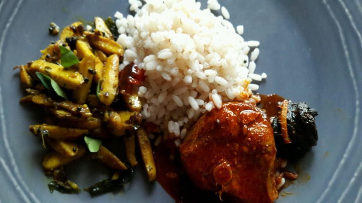 Steamed Kerala rice, fish vevichathu and jackfruit mezhukupuratiathu
