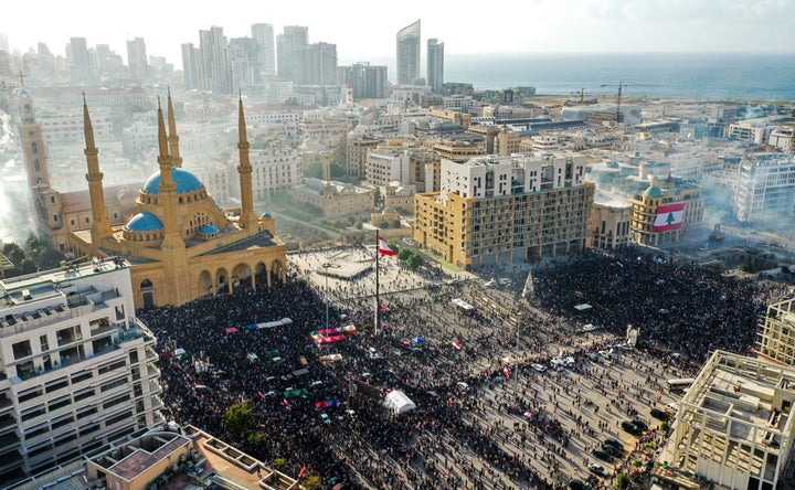 This picture taken on August 8, 2020 shows an aerial view of clashes between demonstrators and security forces, in downtown Beirut on August 8, 2020, following a demonstration against a political leadership they blame for a monster explosion that killed more than 150 people and disfigured the capital Beirut. (Photo by - / AFP) (Photo by -/AFP via Getty Images)