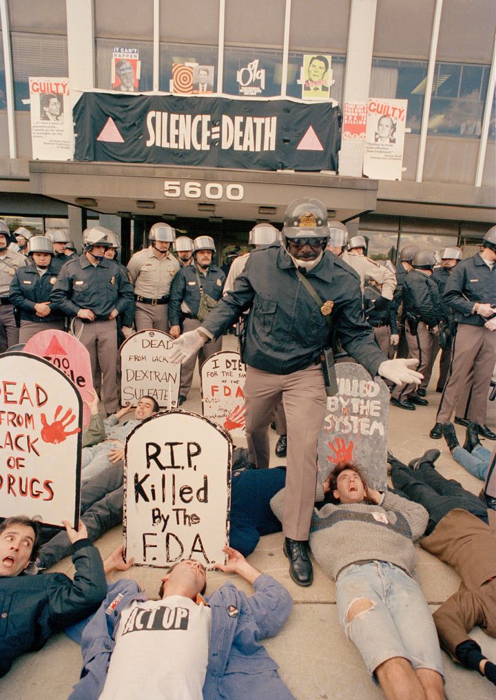 Activist organization ACT UP held protests against the Food and Drug Administration's drug approval processes throughout the 1980s. Some of the shortcuts installed in response to the protests are now being used to develop COVID-19 treatments.