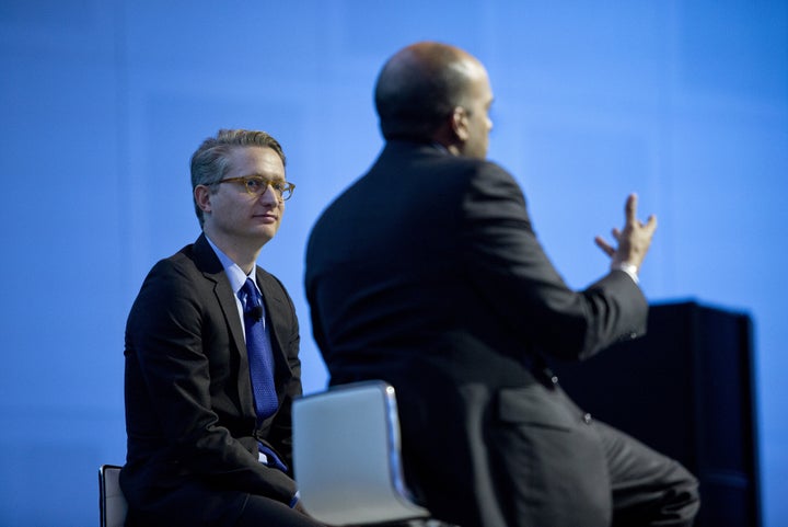 In this 2015 photo, Christian Madsbjerg of Red Associates (left) listens to Raj Nair, executive vice president and chief technical officer of product development for Ford Motor Company, during a press conference at Ford headquarters in Dearborn, Michigan. 