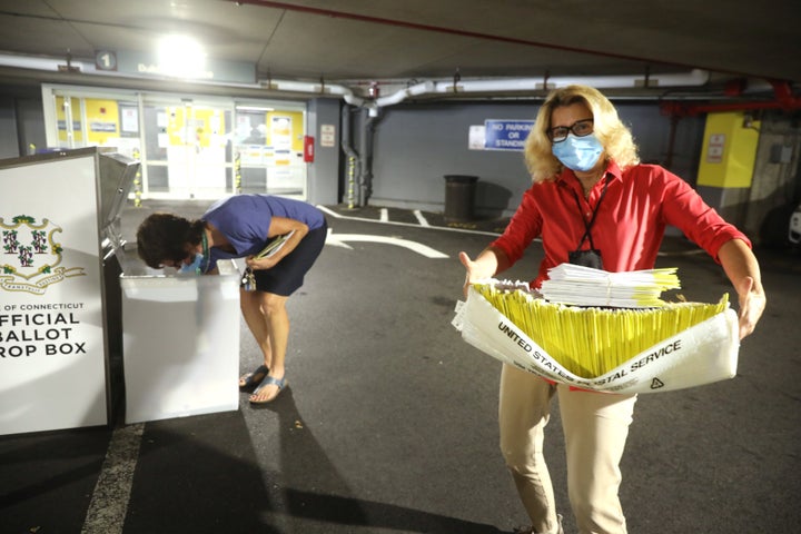 An unprecedented number of absentee ballots flooded election offices during Connecticut's Aug. 11 primary elections.