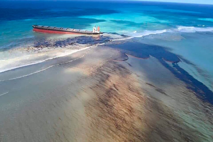 Oil can be seen leaking from the MV Wakashio as Mauritius declared a "state of environmental emergency."