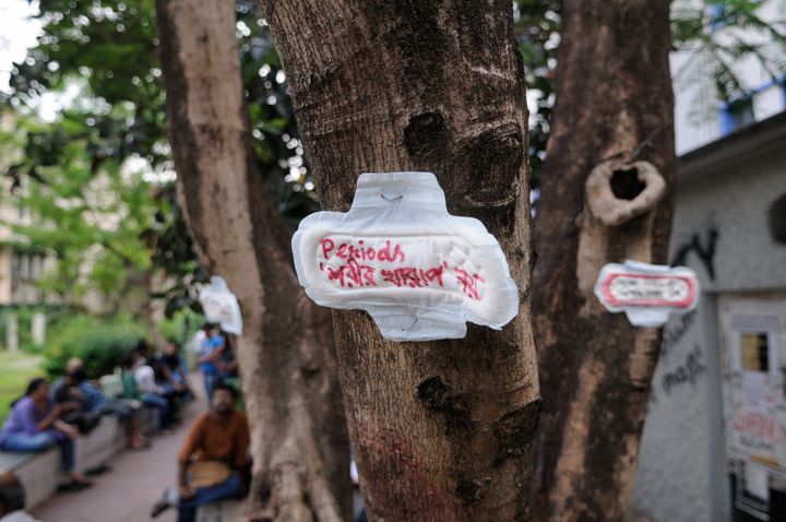 A message written on a sanitary napkin which says "menstruation is not an illness" during a Sanitary napkin protest in Kolkata, India. (Photo by Arindam Shivaani/NurPhoto) (Photo by NurPhoto/NurPhoto via Getty Images)