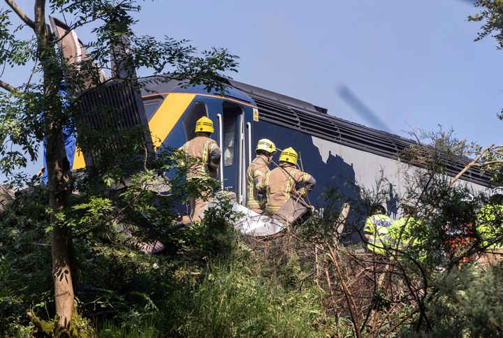 Emergency services attend the scene of a derailed train in Stonehaven.