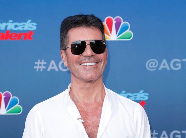 Simon Cowell Is Already On The Mend After Surgery On Broken Back, Says Co-Star Heidi Klum