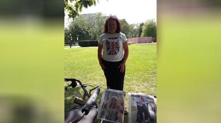 Sandie Berenger at a silent protest to bring awareness to long-term care conditions at Queen's Park in Toronto, Ont. on July 26, 2020.