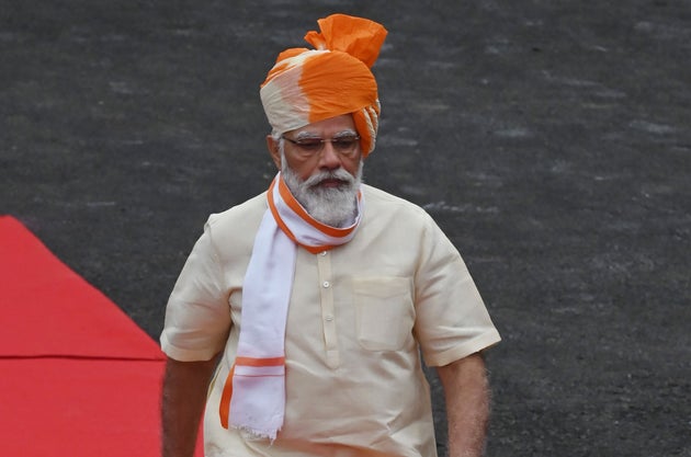 Prime Minister Narendra Modi reviews a guard of honour during a ceremony to celebrate India's 74th Independence...