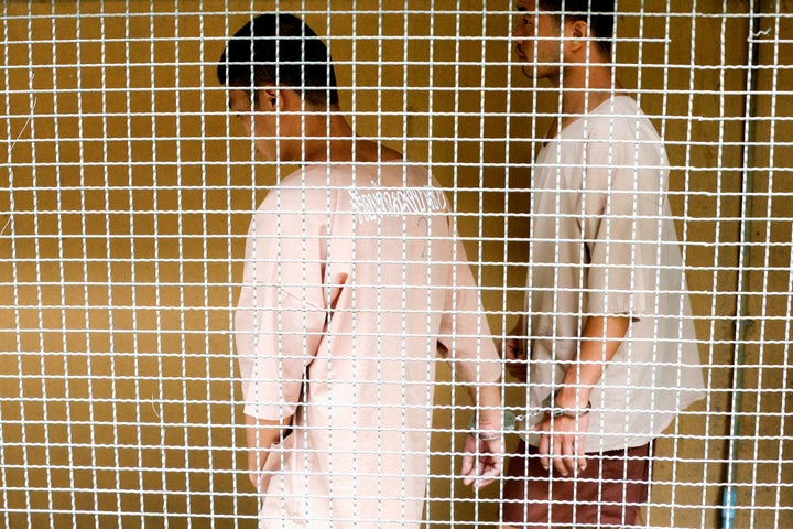 Myanmar migrant workers Zaw Lin and Win Zaw Htun leave after a hearing at the Nonthaburi provincial court in Thailand, August 29, 2019.